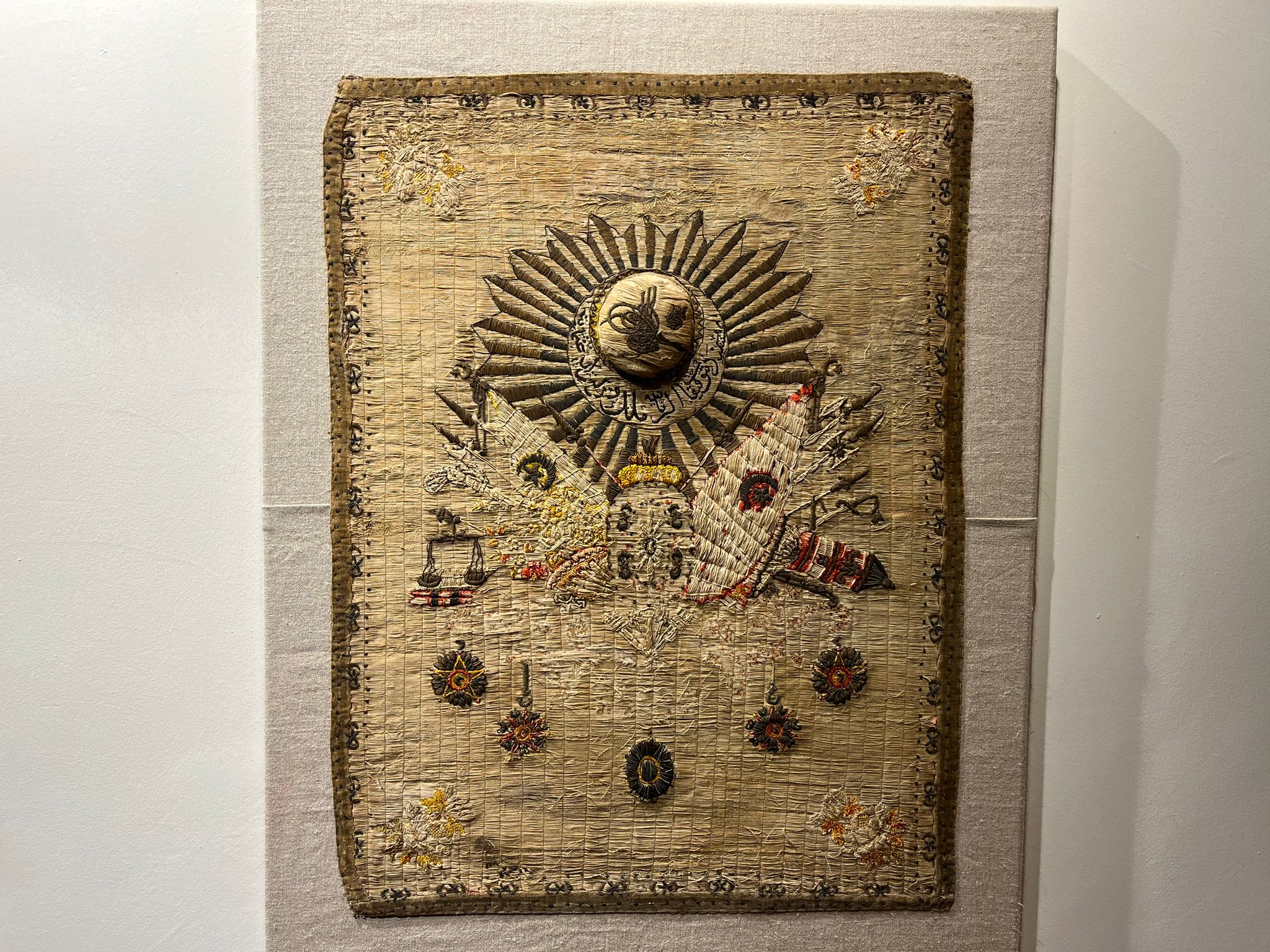 An embroidered Ottoman textile hung in the Gordes rooms